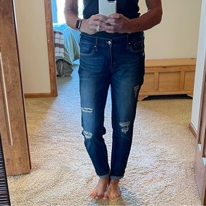 Girlfriend jeans, lots of accents and detail.